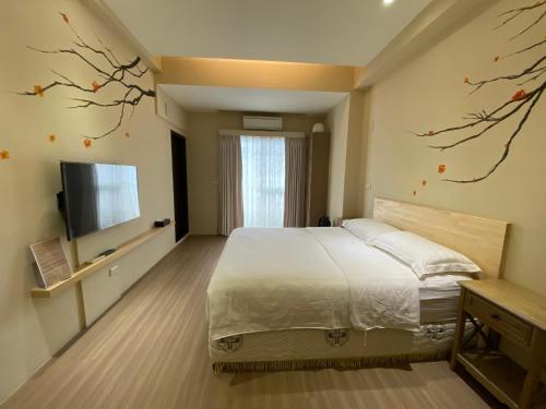 TV i/ili multimedijalni sistem u objektu Follow Me B&B