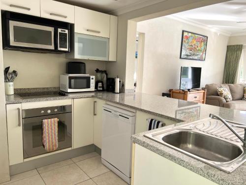  Rockley Golf 810 is a 2 bedroom, 2 Bathroom 1st floor Apartment with pool -  Room  picture :   TV    Telephone    Air conditioning                           