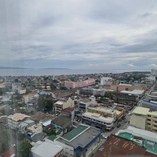 an aerial view of a city with buildings at Avida Davao by davaobnb & Lemonique Homes in Davao City