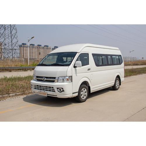 a white van parked on the side of a road at Alpha Suites Hotel in Salalah