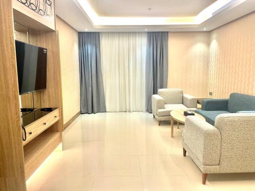 Телевизор и/или развлекательный центр в Mirnian Hotel