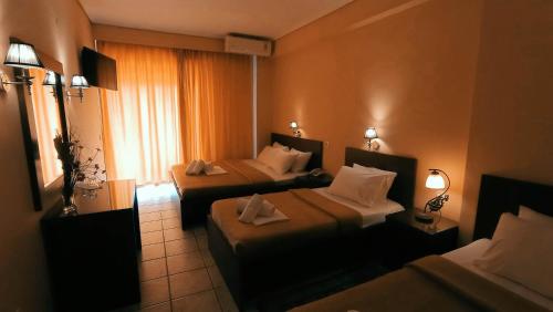 Postel nebo postele na pokoji v ubytování Hotel Lito