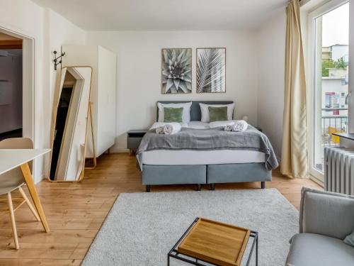 Ένα ή περισσότερα κρεβάτια σε δωμάτιο στο Limehome Kassel Motzstraße
