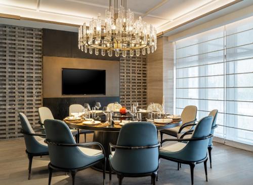 TV a/nebo společenská místnost v ubytování Prime Hotel Beijing Wangfujing