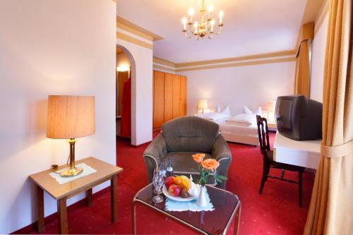 Postel nebo postele na pokoji v ubytování Hotel Luitpold
