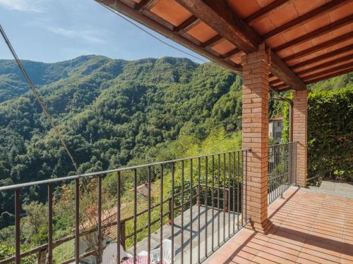 a balcony with a view of the mountains at Holiday Home Da Franca by Interhome in Stazzema