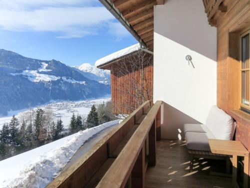 a balcony with a view of a snowy mountain at Apartment Moarerlechenhof-1 by Interhome in Hart im Zillertal