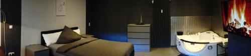 Luxus-Appartement tesisinde bir odada yatak veya yataklar