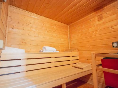 a room with a sauna with a telephone in it at Chalet Waldner by Interhome in Thannrain