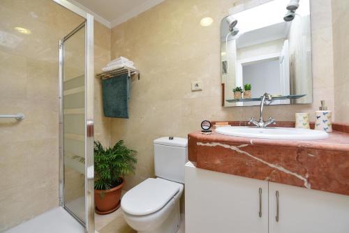 A bathroom at Apartment El Confital RF18 by VillaGranCanaria