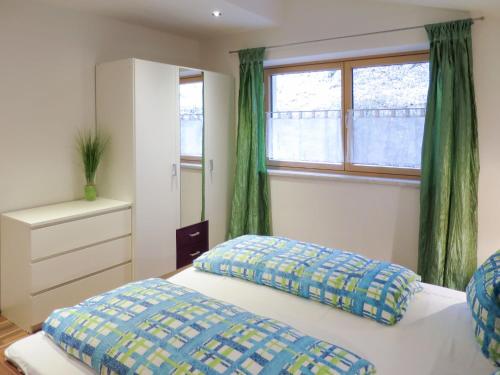 Postel nebo postele na pokoji v ubytování Apartment Gitti by Interhome