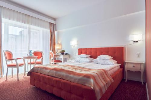 Кровать или кровати в номере Continental Forum Constanta