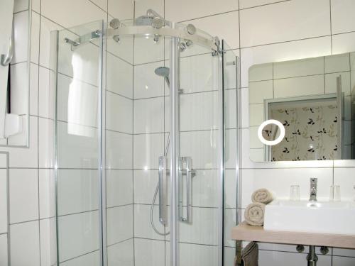 a bathroom with a shower and a sink at Apartment Fuchs-1 by Interhome in Donnerskirchen