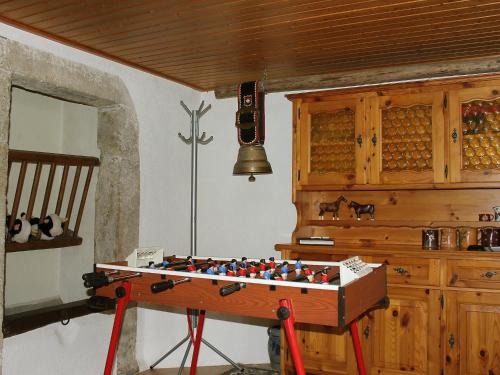 a lego table in the corner of a room at Apartment Les Grangettes by Interhome in Auberson