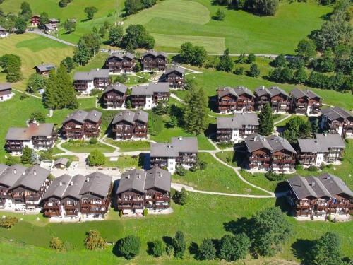 an overhead view of a large estate with houses at Apartment Aragon T100 by Interhome in Fiesch