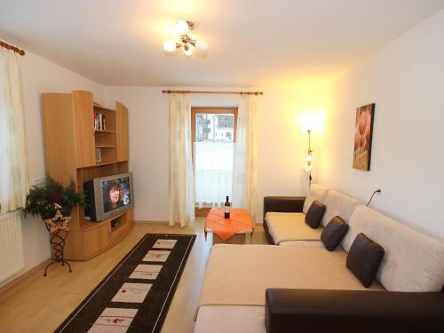 A seating area at Apartment Lueg ins Land by Interhome