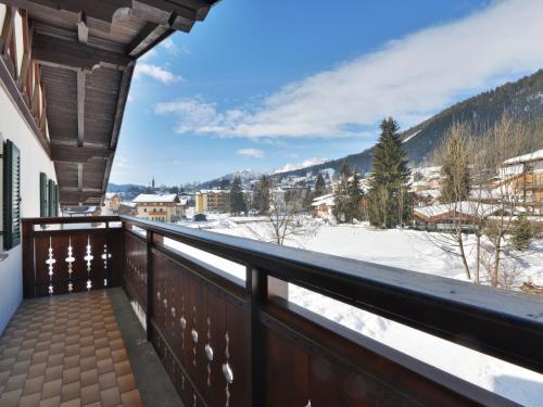 a balcony with a view of the snow covered mountains at Apartment Cincelli - Marmolada by Interhome in Pozza di Fassa