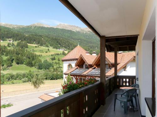 a balcony with a view of the mountains at Apartment Haupthaus Schönblick - SVH116 by Interhome in San Valentino alla Muta