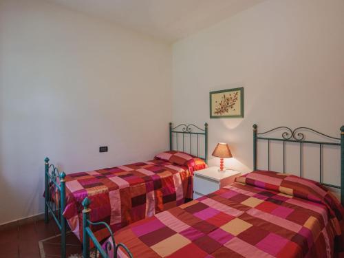 Postel nebo postele na pokoji v ubytování Holiday Home Luca by Interhome