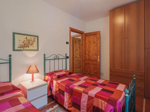 Postel nebo postele na pokoji v ubytování Holiday Home Luca by Interhome