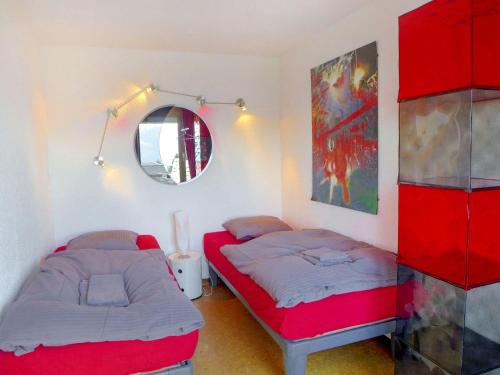 Katil atau katil-katil dalam bilik di Apartment Jeanne D'Arc Apt- C-19 by Interhome