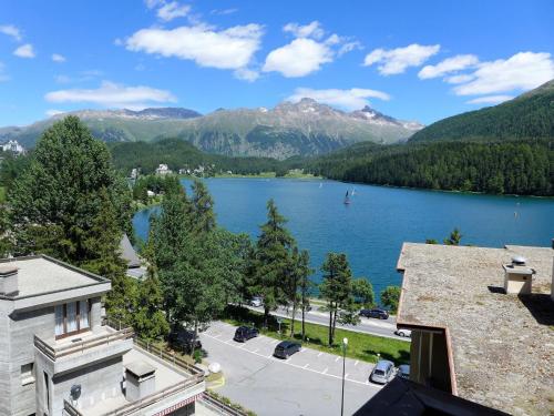 a view of a lake with mountains in the background at Apartment Chesa Sonnalpine B 46 by Interhome in St. Moritz