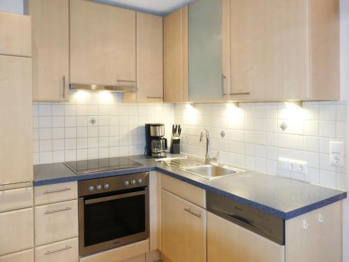 Kuchyň nebo kuchyňský kout v ubytování Apartment Viktoria by Interhome