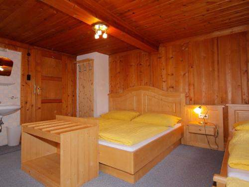 Postel nebo postele na pokoji v ubytování Ferienhaus Tux Holiday Home