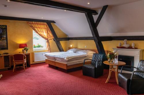 Postel nebo postele na pokoji v ubytování Hotel Landhaus Knappmann