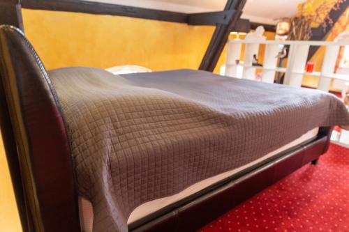 Ένα ή περισσότερα κρεβάτια σε δωμάτιο στο Hotel Landhaus Knappmann