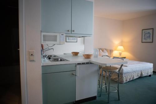 Kuchyň nebo kuchyňský kout v ubytování pepb Schulungshotel