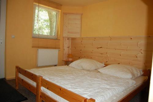 Katil atau katil-katil dalam bilik di Ferien im Gutspark Schwarbe mit Re