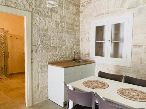 A kitchen or kitchenette at Antico Corso 74