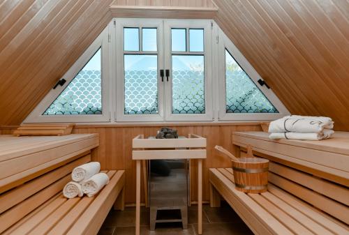 Postel nebo postele na pokoji v ubytování Jaumann's Südwind Sylt