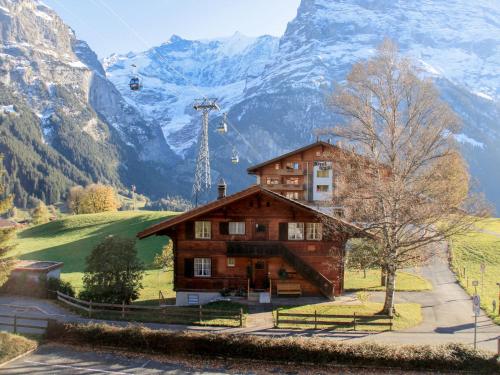 a house in the mountains with a ski lift at Apartment Bodmisunne by Interhome in Grindelwald
