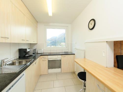 Köök või kööginurk majutusasutuses Apartment Guardaval - Utoring-66 by Interhome