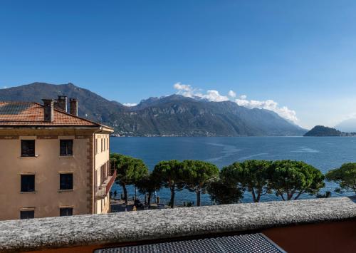 a view of the lake and mountains from a building at La Dependance in Menaggio