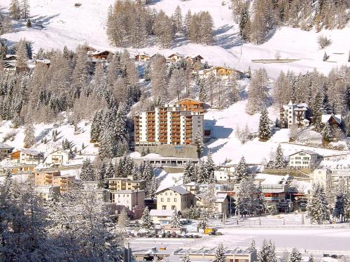 a town covered in snow with a resort at Apartment Guardaval - Utoring-44 by Interhome in Davos