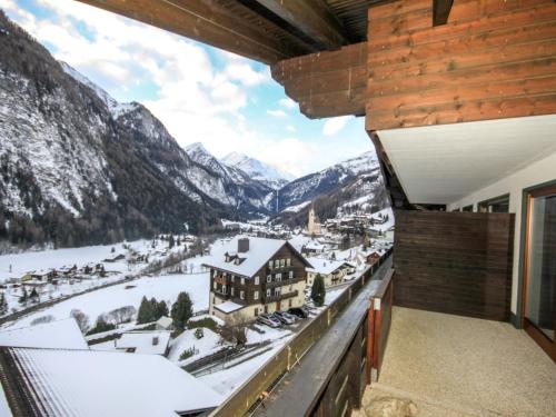 a balcony with a view of the mountains at Studio Top 46 A by Interhome in Heiligenblut