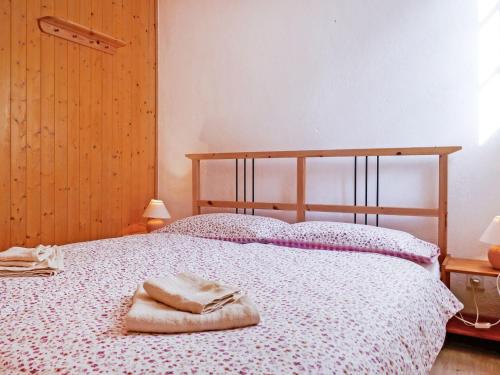 Ένα ή περισσότερα κρεβάτια σε δωμάτιο στο Holiday Home Casa Rustica Angela by Interhome