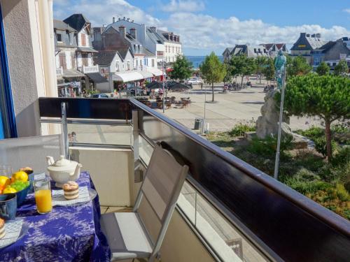 a balcony with a table and a view of a street at Apartment Résidence Le Grand Bleu by Interhome in Quiberon