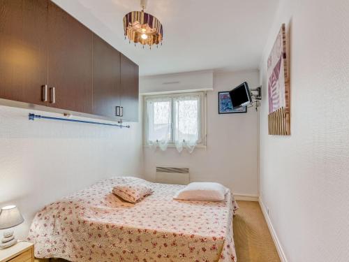 מיטה או מיטות בחדר ב-Apartment Plein Sud by Interhome