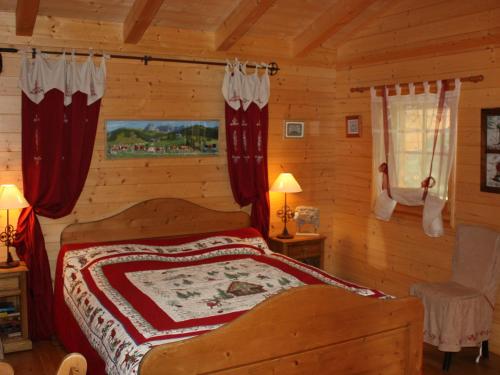 Una cama o camas en una habitación de Chalet Dörfli by Interhome