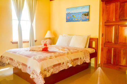 Ліжко або ліжка в номері Royal Caribbean Resort
