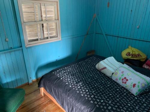 Säng eller sängar i ett rum på Casa de Campo Cambará