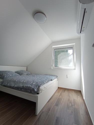 Postel nebo postele na pokoji v ubytování Relax Apartment
