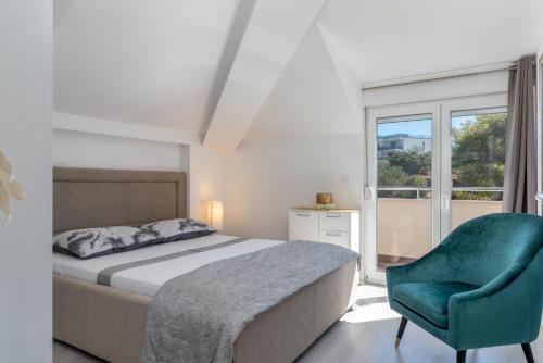 Posteľ alebo postele v izbe v ubytovaní Apartments Villa Pupa