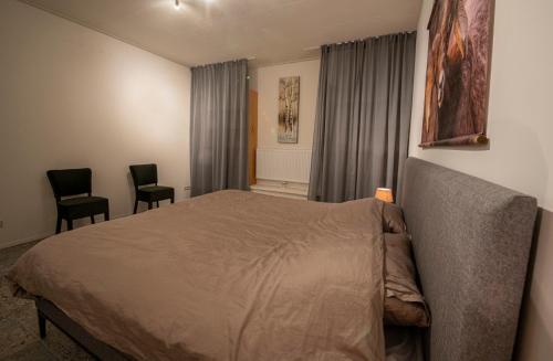 Katil atau katil-katil dalam bilik di Brinkzicht Diever, appartement Lisanne