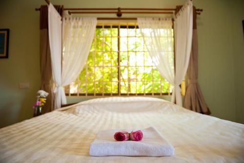 Katil atau katil-katil dalam bilik di Villa Grange