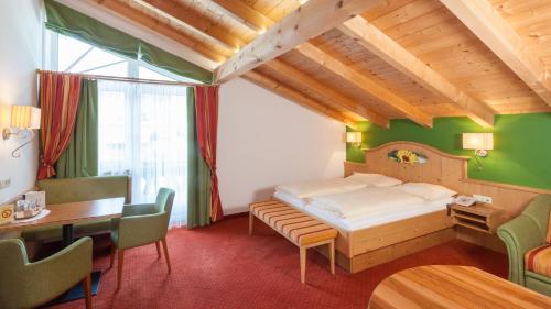 Postel nebo postele na pokoji v ubytování Hotel-Pension Wagnermigl